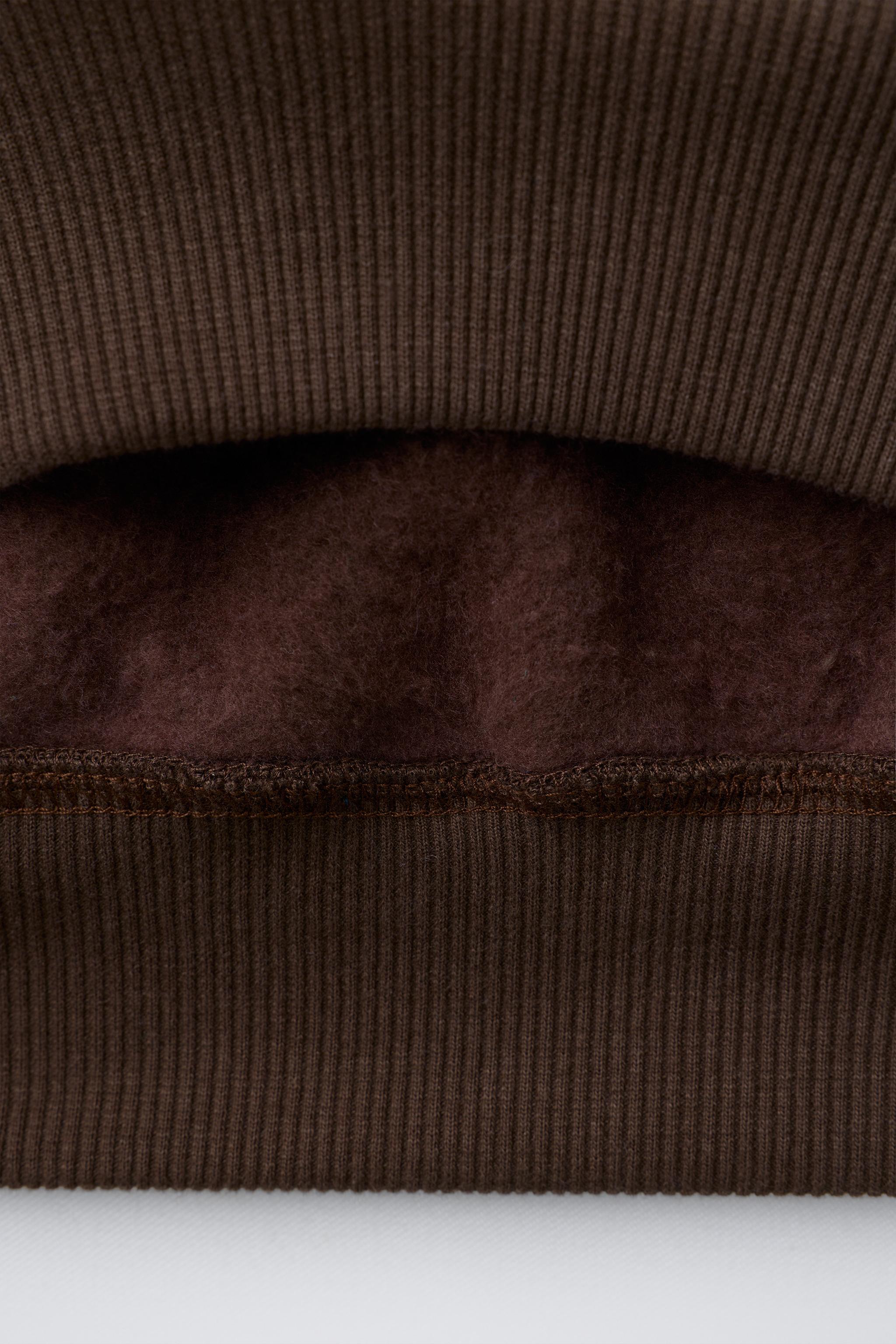 SWEAT IMPRIMÉ THE GRINCH ™ DR. SEUSS ENTERPRISES ©